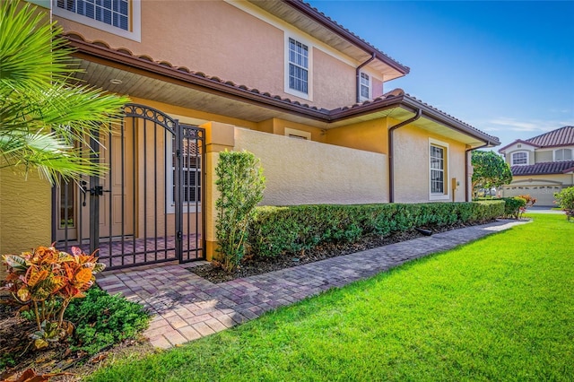 view of property exterior featuring a yard