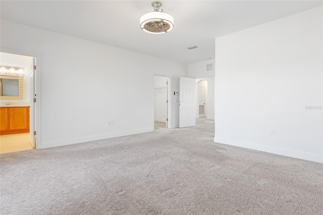 empty room with light carpet