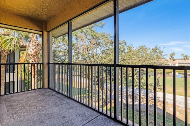 unfurnished sunroom with a wealth of natural light