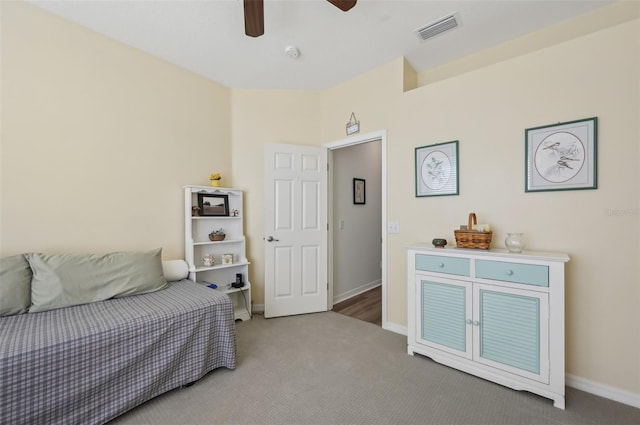 carpeted bedroom with ceiling fan