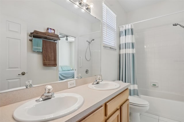 full bathroom featuring vanity, tile patterned floors, shower / bath combination with curtain, and toilet