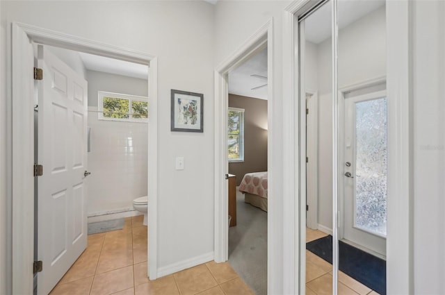 interior space with light tile patterned floors