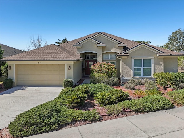 ranch-style home featuring a garage