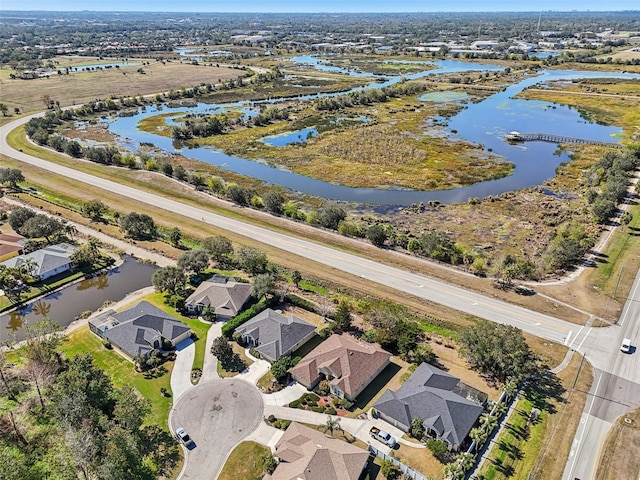 bird's eye view with a water view