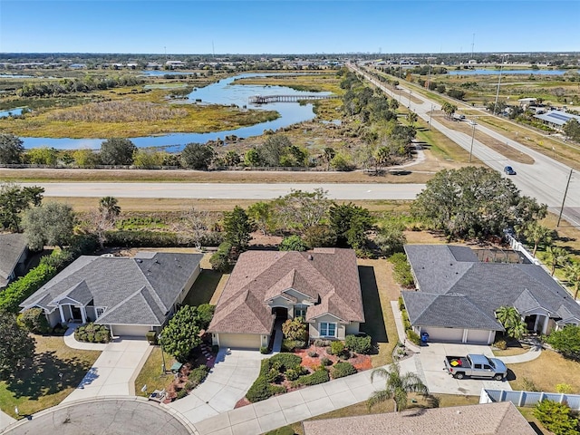 drone / aerial view featuring a water view