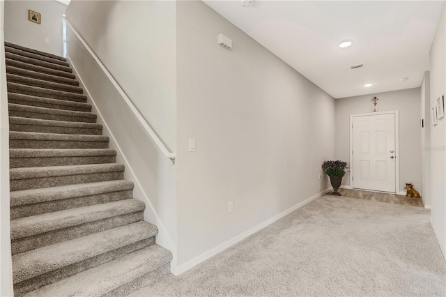 stairs with carpet floors