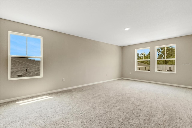 view of carpeted spare room