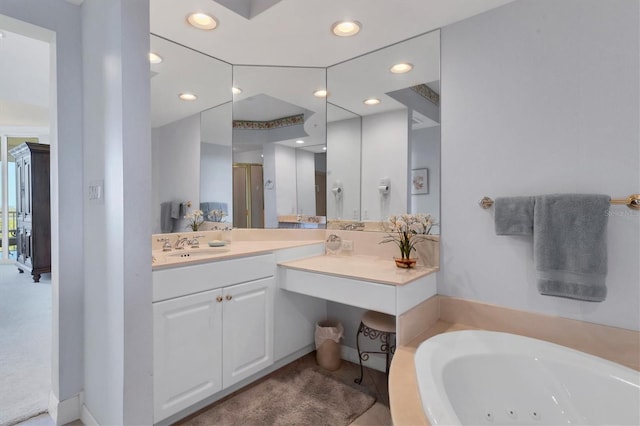 bathroom with vanity and shower with separate bathtub