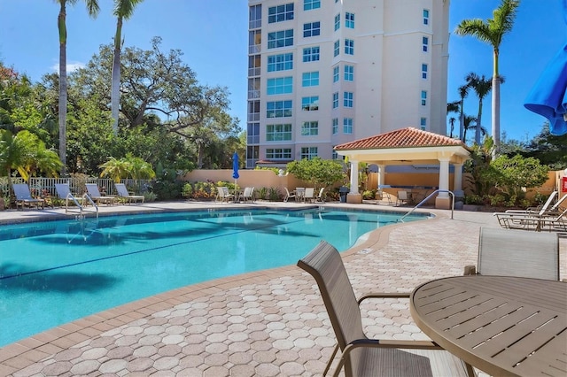 view of pool featuring a gazebo and a patio area