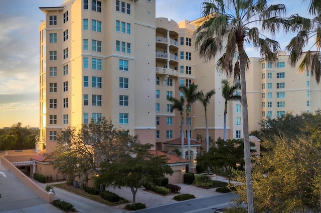 view of outdoor building at dusk