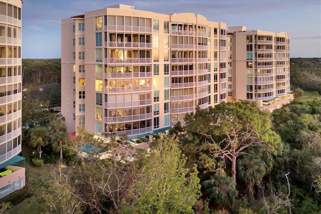 view of outdoor building at dusk