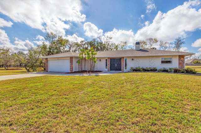 ranch-style house featuring a garage and a front yard