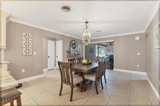 tiled dining area with ornamental molding and a notable chandelier