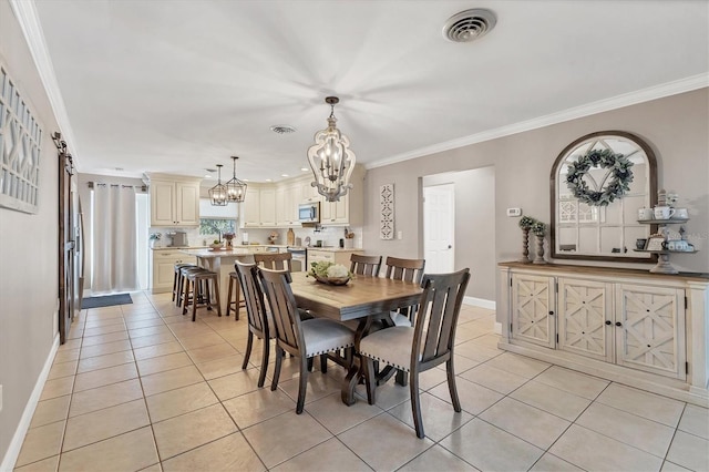 tiled dining area featuring crown molding and an inviting chandelier