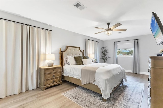 bedroom featuring light hardwood / wood-style flooring and ceiling fan