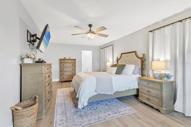 bedroom featuring ceiling fan and light hardwood / wood-style floors