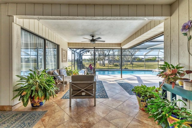 view of swimming pool featuring ceiling fan