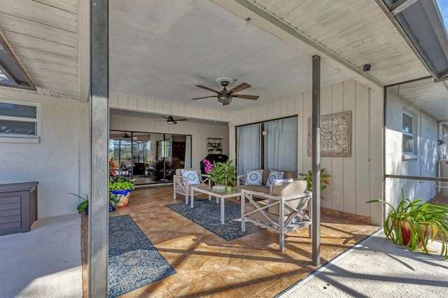 view of patio featuring an outdoor living space and ceiling fan