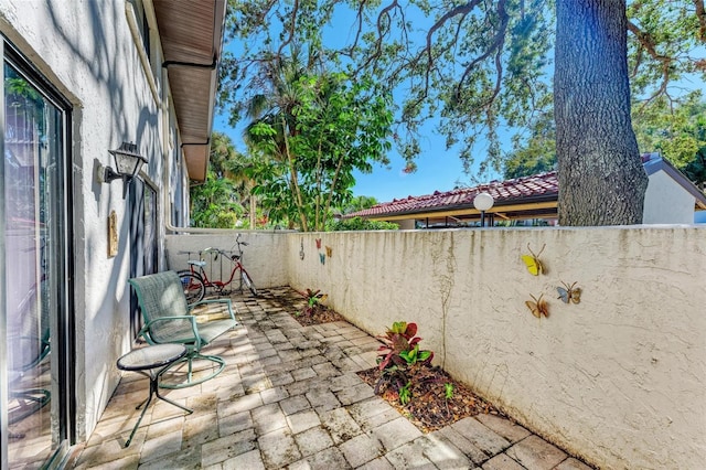 view of patio / terrace with fence