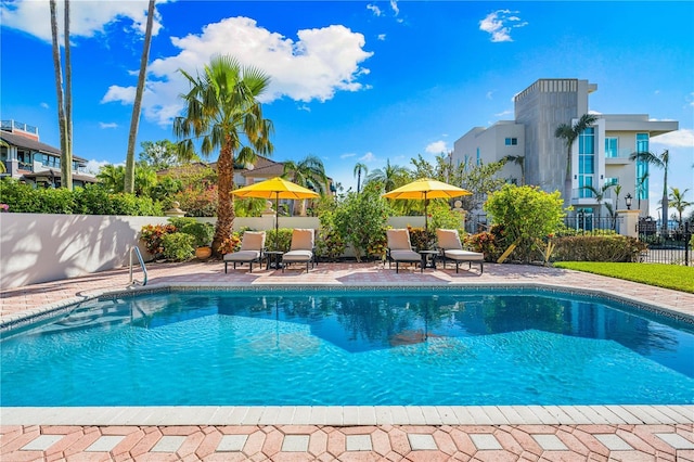 view of swimming pool featuring a patio