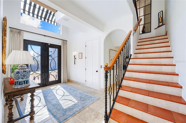 foyer featuring french doors