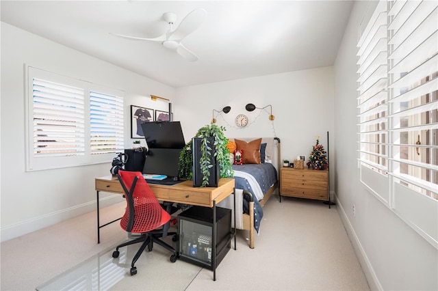 carpeted bedroom with ceiling fan