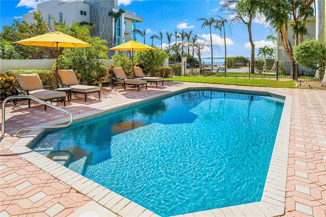 view of swimming pool featuring a patio area