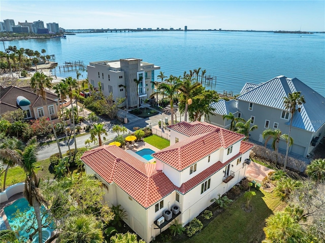 bird's eye view with a water view