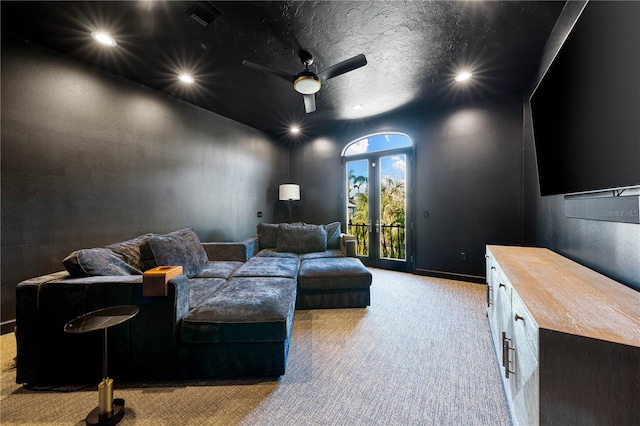 cinema room featuring ceiling fan, a textured ceiling, recessed lighting, light carpet, and visible vents