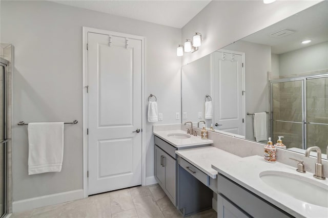 bathroom with vanity and an enclosed shower