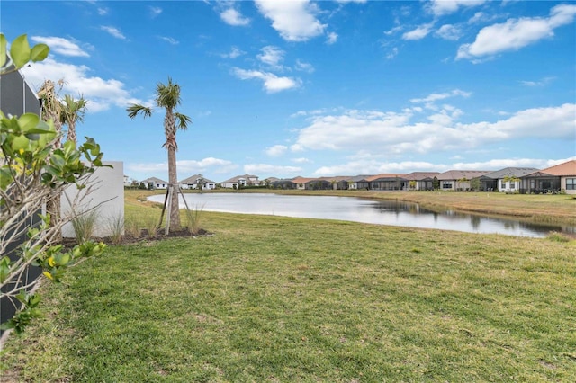 view of yard with a water view