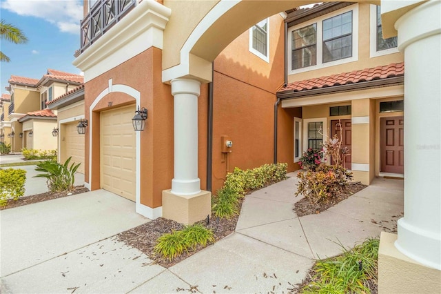 entrance to property featuring a garage