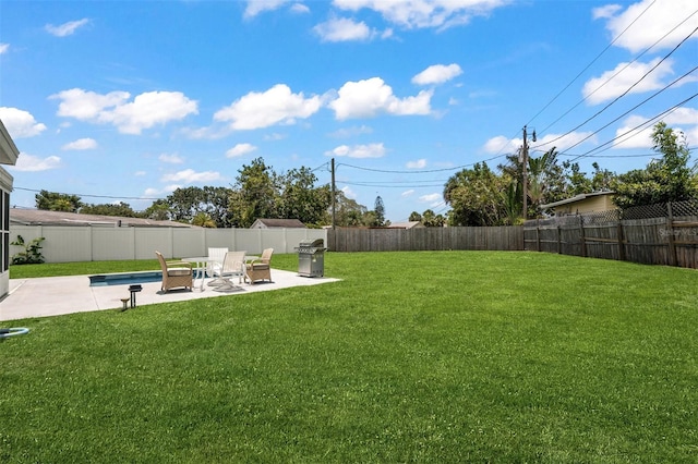 view of yard with a patio area