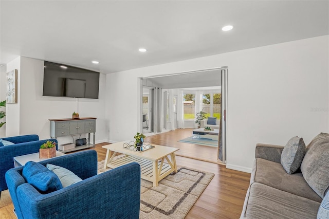 living room with light hardwood / wood-style floors