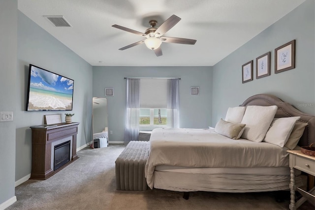 carpeted bedroom with ceiling fan