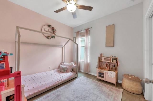 bedroom featuring ceiling fan and carpet flooring