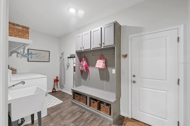 mudroom featuring hardwood / wood-style floors and sink