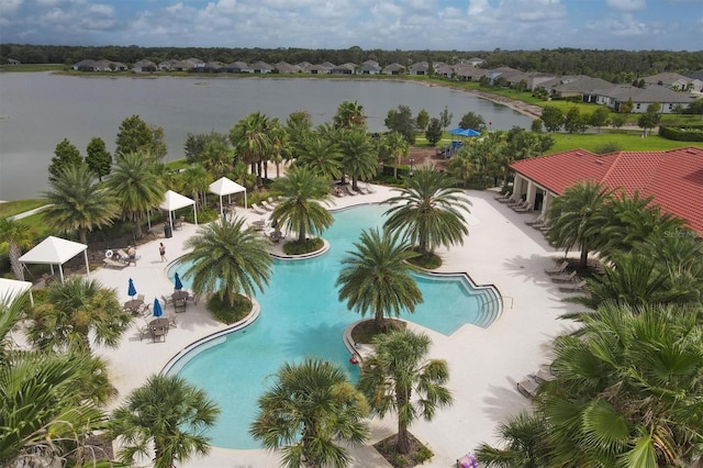 birds eye view of property featuring a water view