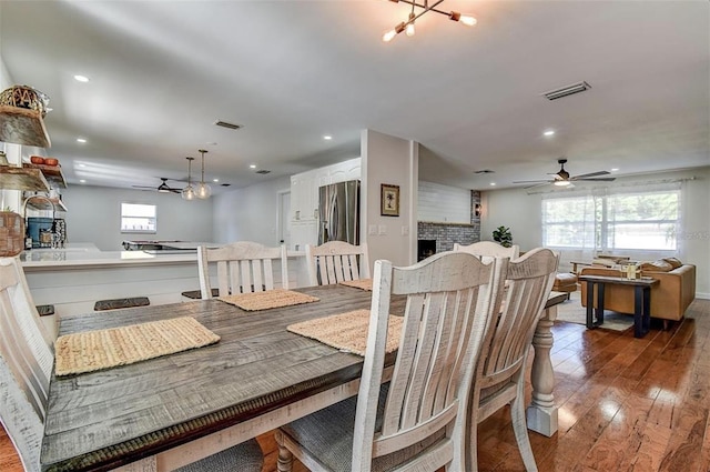 dining room featuring hardwood / wood-style floors and ceiling fan