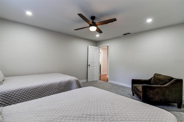 bedroom with light colored carpet and ceiling fan