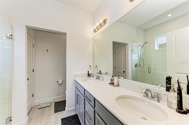 bathroom featuring vanity and walk in shower