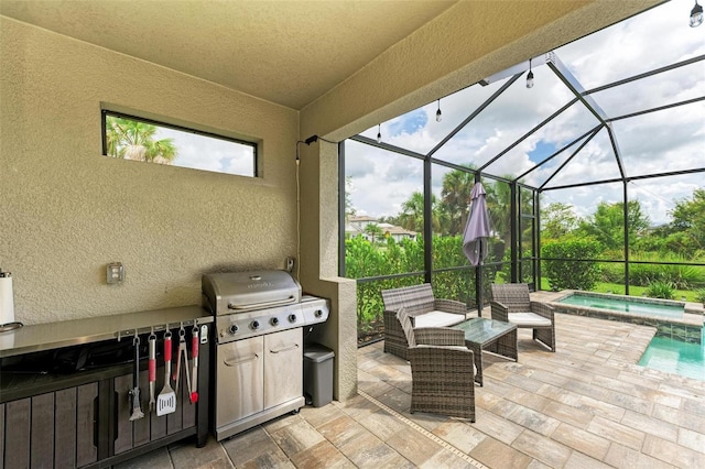 view of patio featuring outdoor lounge area and a lanai