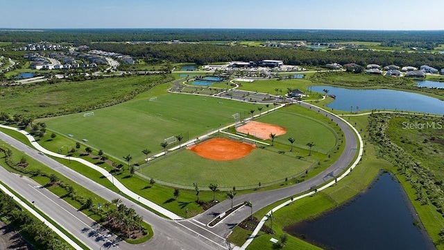 drone / aerial view with a water view