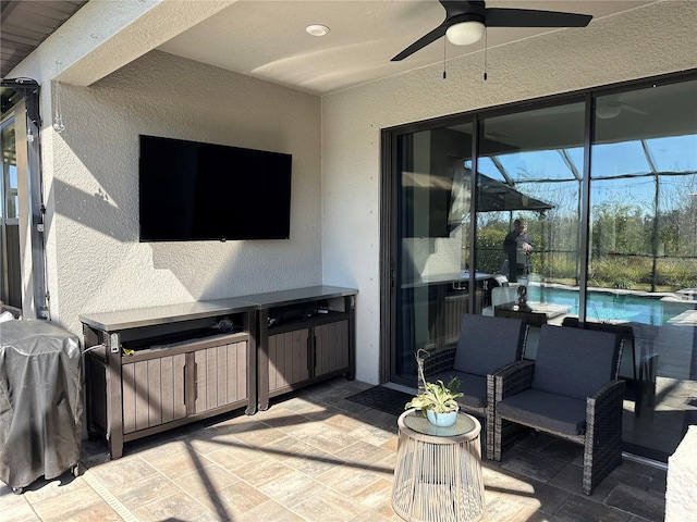 view of patio / terrace featuring ceiling fan