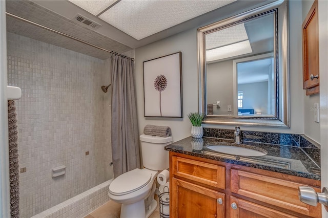 bathroom featuring vanity, a shower with curtain, and toilet