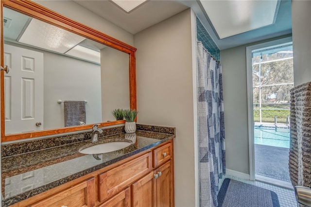 bathroom featuring vanity and tile patterned flooring