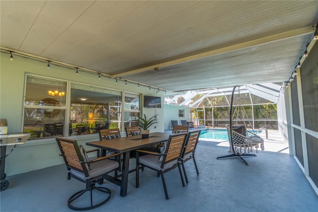 view of patio with a lanai