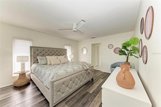 bedroom featuring dark wood-type flooring and ceiling fan