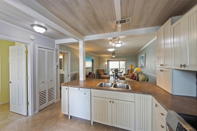 kitchen with sink, stainless steel electric range, white cabinets, dishwasher, and light tile patterned floors