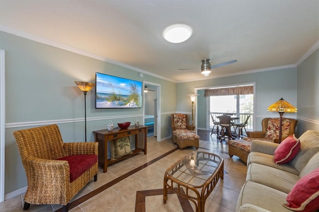 tiled living room with ornamental molding and ceiling fan